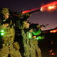 Illustration for article titled Airmen Throw Sparks And Glow In The Dark In Night Live Fire Training